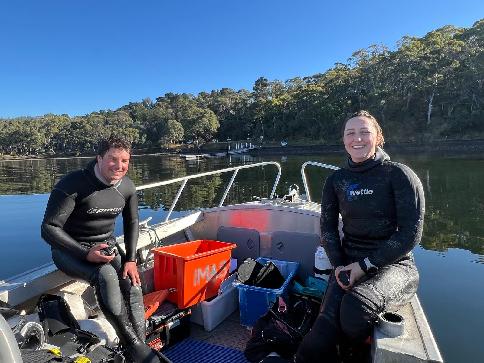 Field team members warming up after dive work